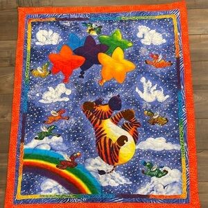 Homemade quilt 35”x 41” in  the most whimsical print with contrasting edging